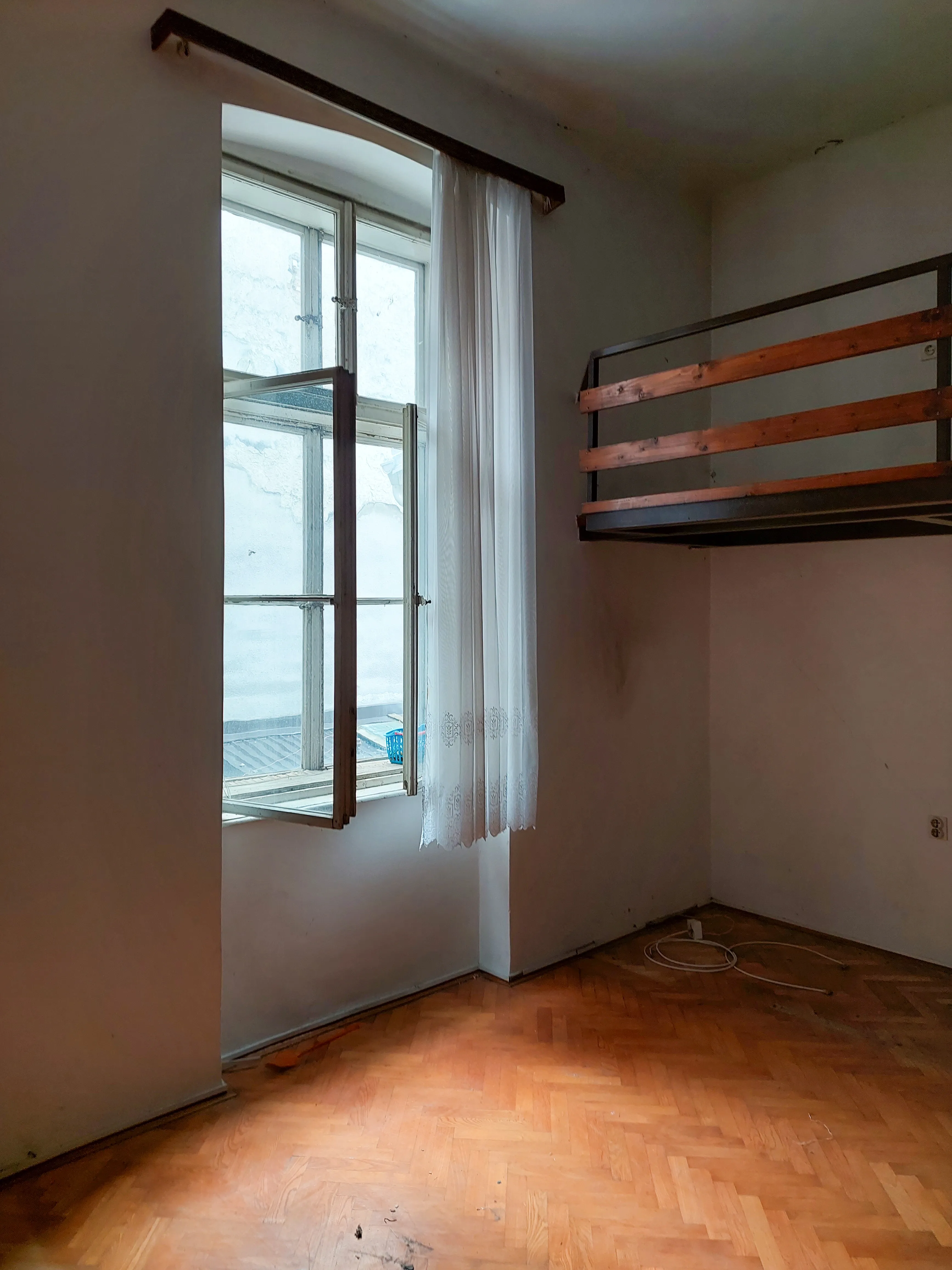 Zagreb Croatia short-term rental apartment before renovation - dated surfaces and low natural light